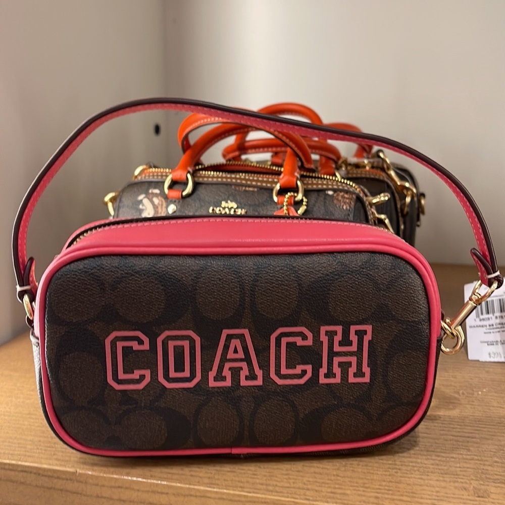 Coach Jamie Wristlet In Signature Canvas With Varsity Motif
IM/Brown/Watermelon - Picture 13 of 16